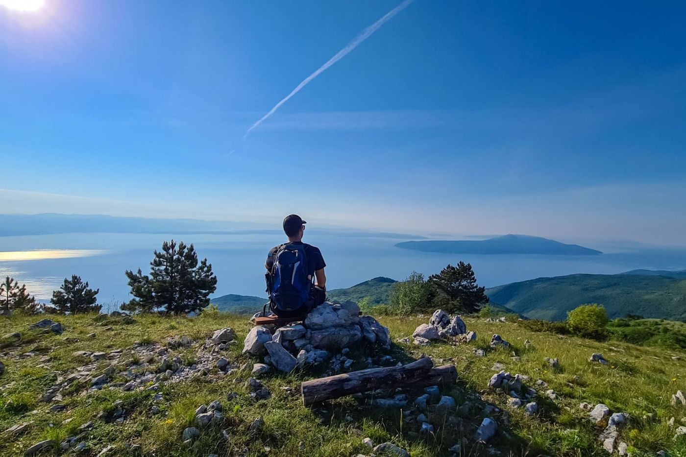 Hiker at Vojak Lookout overlooking the Istrian coast and islands